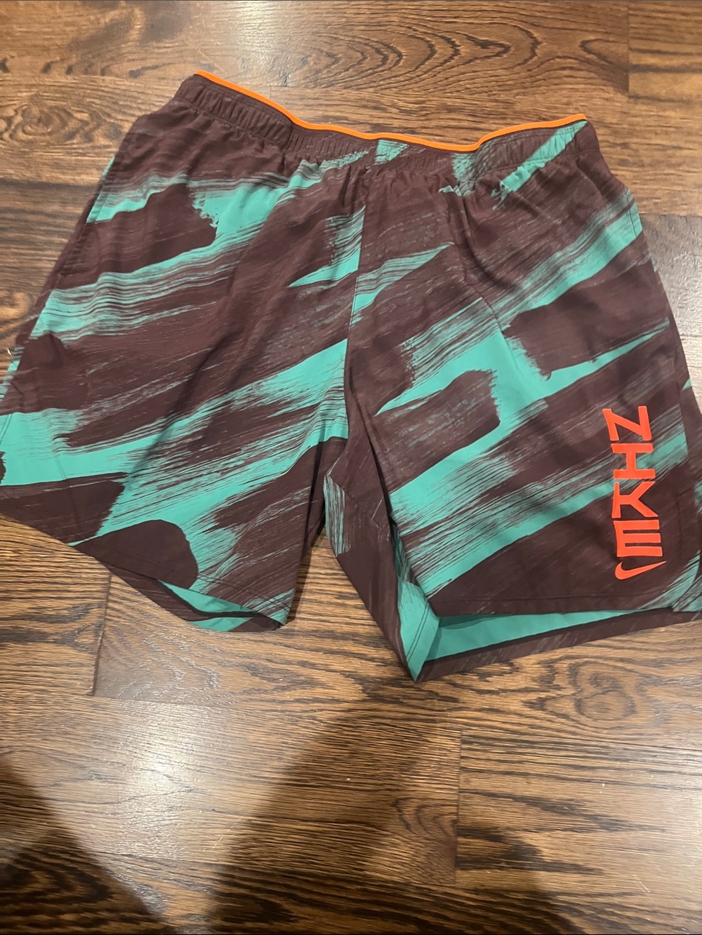 Nike Men’s Brown & Teal Swim Trunks with Orange Logo
